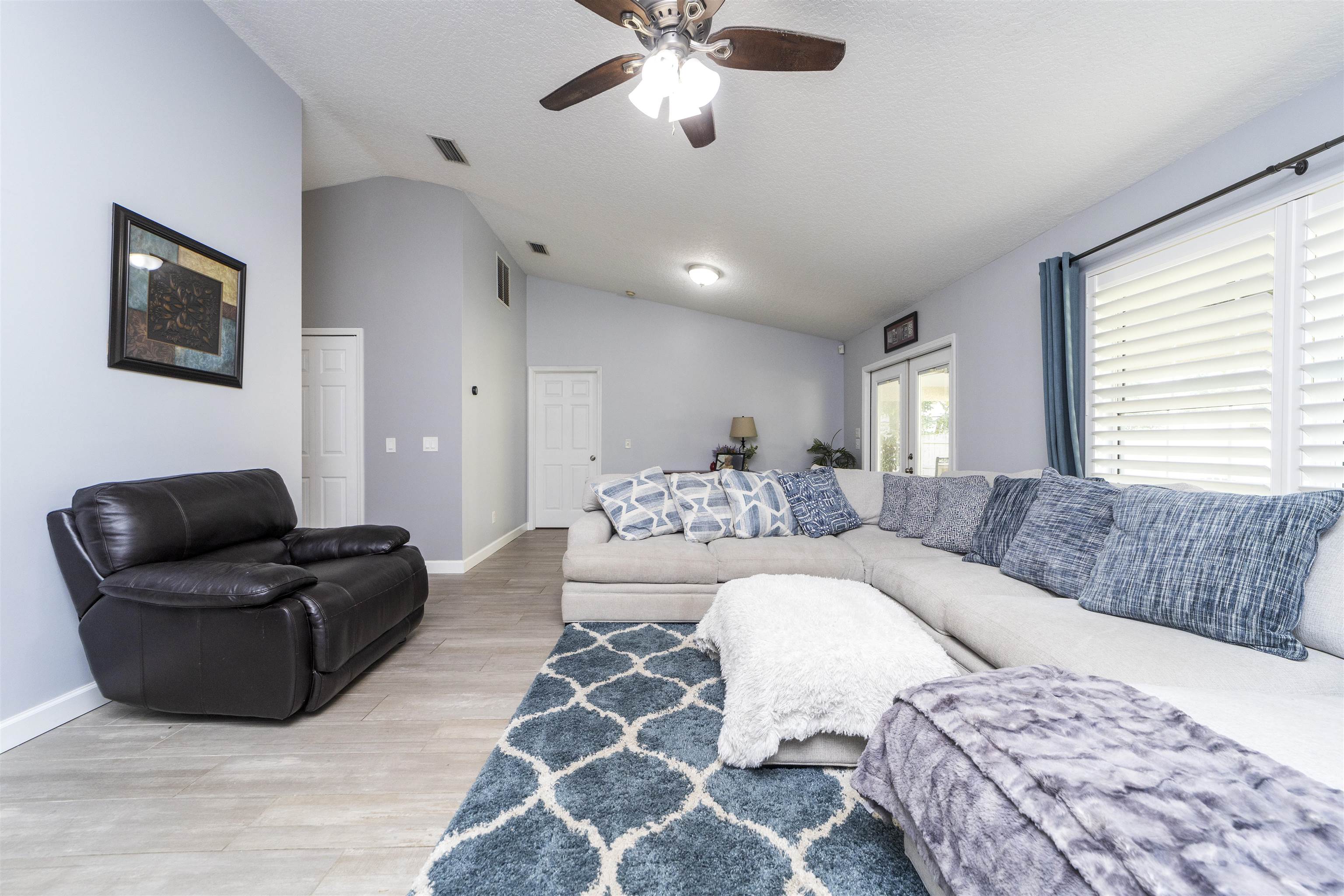 845 Wildwood Drive St. Augustine, FL 32086 - Photo 10 of 58 a living room with furniture and a large window