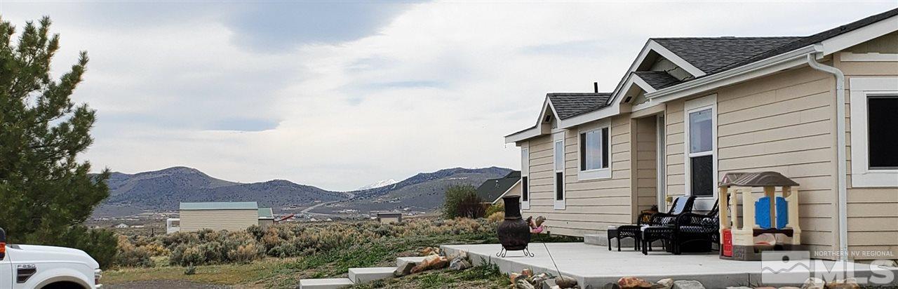1223 Alum Rock Road Reno, NV 89506 - Photo 11 of 21 a view of a house with a yard