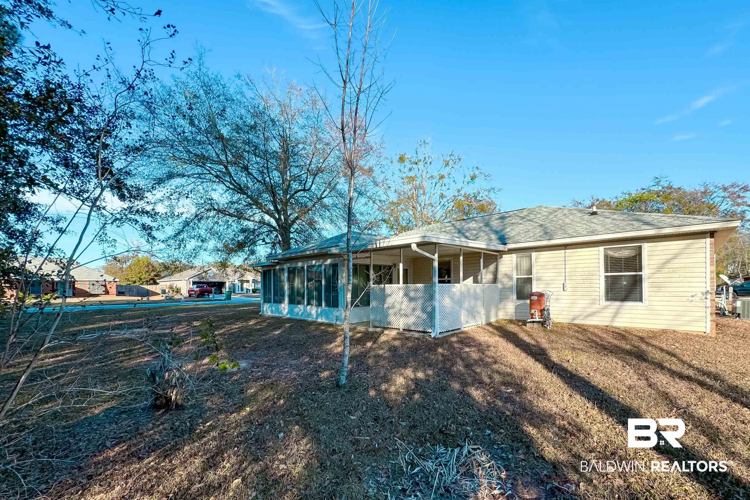 1 Bay Circle Foley, AL 36535 - Photo 27 of 28 Rear view of property with a sunroom