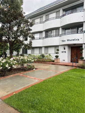 a front view of a building with street view