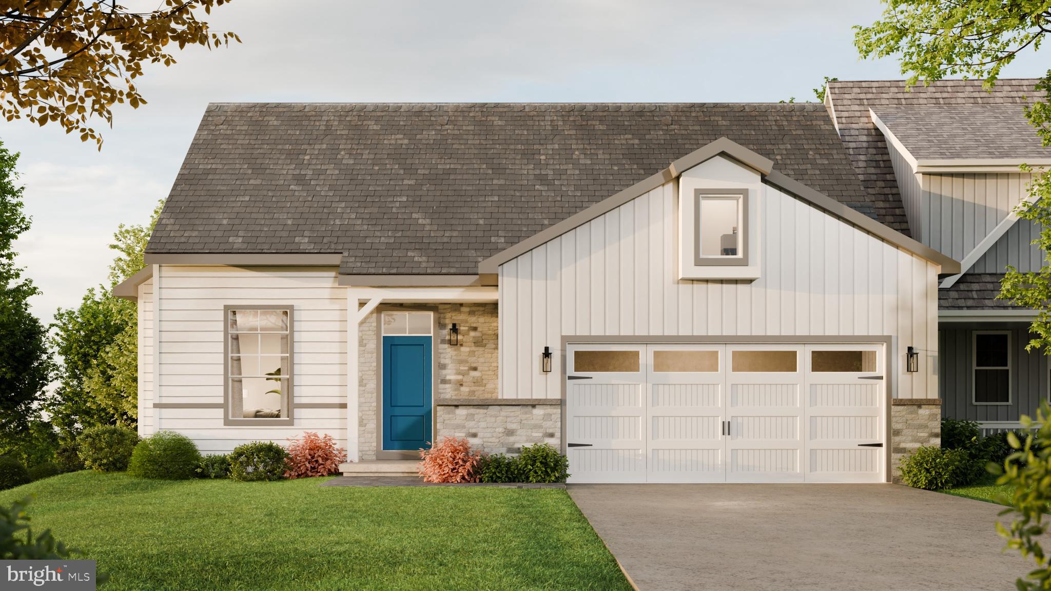 4331 Heather Lane, Unit 44 Columbia, PA 17512 - Photo 1 of 16 a front view of a house with a garden and plants