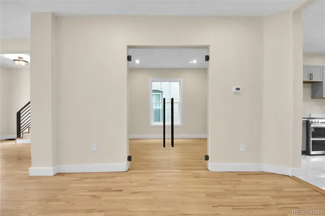 a bathroom with a toilet sink and shower