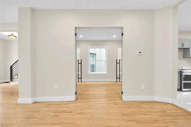 a kitchen with counter top space cabinets and stainless steel appliances