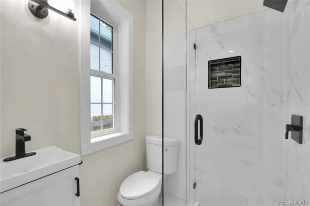 a kitchen with a sink and a window