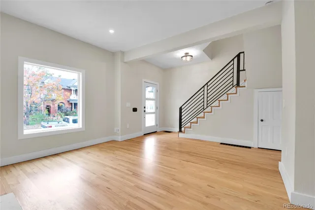 a view of a kitchen and a natural light