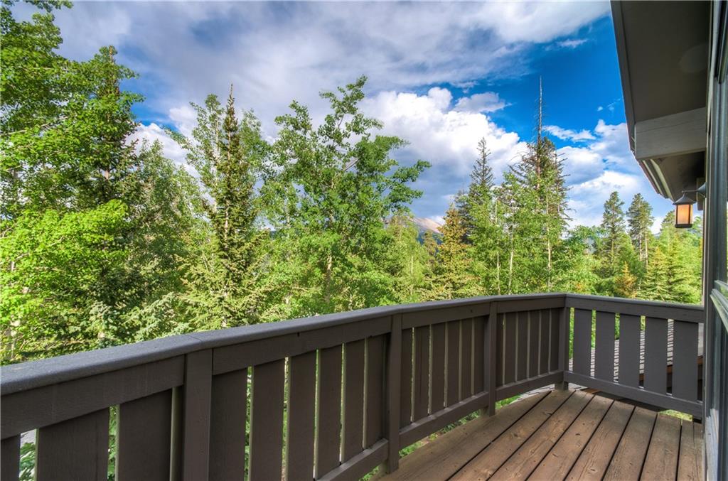 1025 4 O Clock Road Breckenridge, CO 80424 - Photo 13 of 25 a balcony with wooden floor