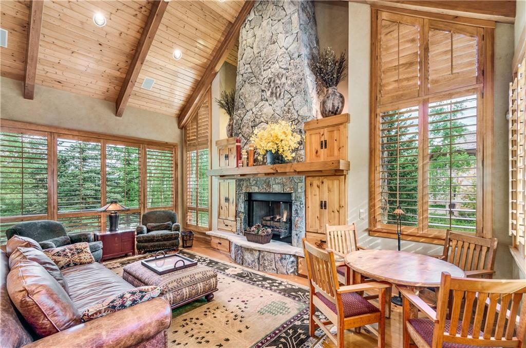 1025 4 O Clock Road Breckenridge, CO 80424 - Photo 7 of 25 a living room with furniture and a fireplace