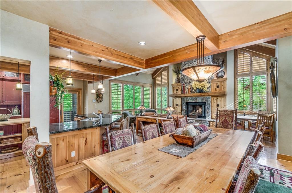 1025 4 O Clock Road Breckenridge, CO 80424 - Photo 9 of 25 a view of a dining room with furniture window and outside view