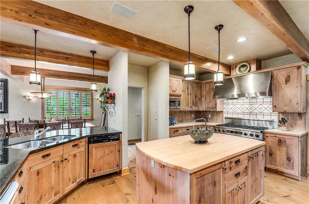 1025 4 O Clock Road Breckenridge, CO 80424 - Photo 10 of 25 a kitchen that has a lot of cabinets in it