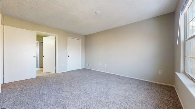 an empty room with windows