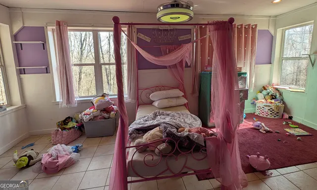 a room with a couch and a window