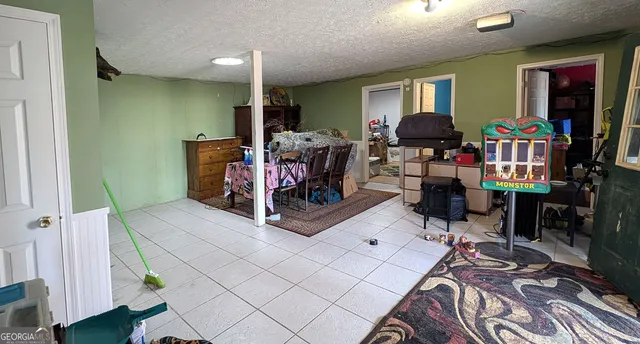 a bathroom with a sink toilet and mirror