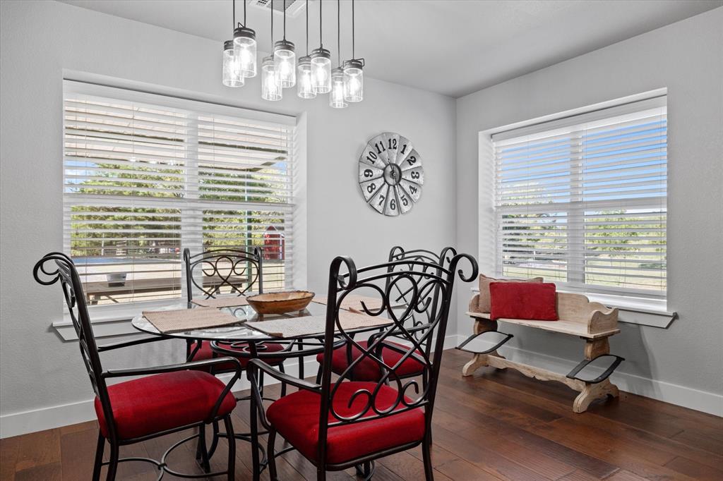 725 Wilson Road Van Alstyne, TX 75495 - Photo 22 of 40 a view of a dining room with furniture window and outside view