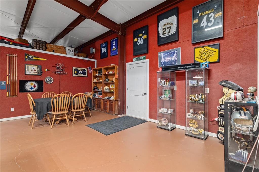 725 Wilson Road Van Alstyne, TX 75495 - Photo 29 of 40 a chairs and a table in a room