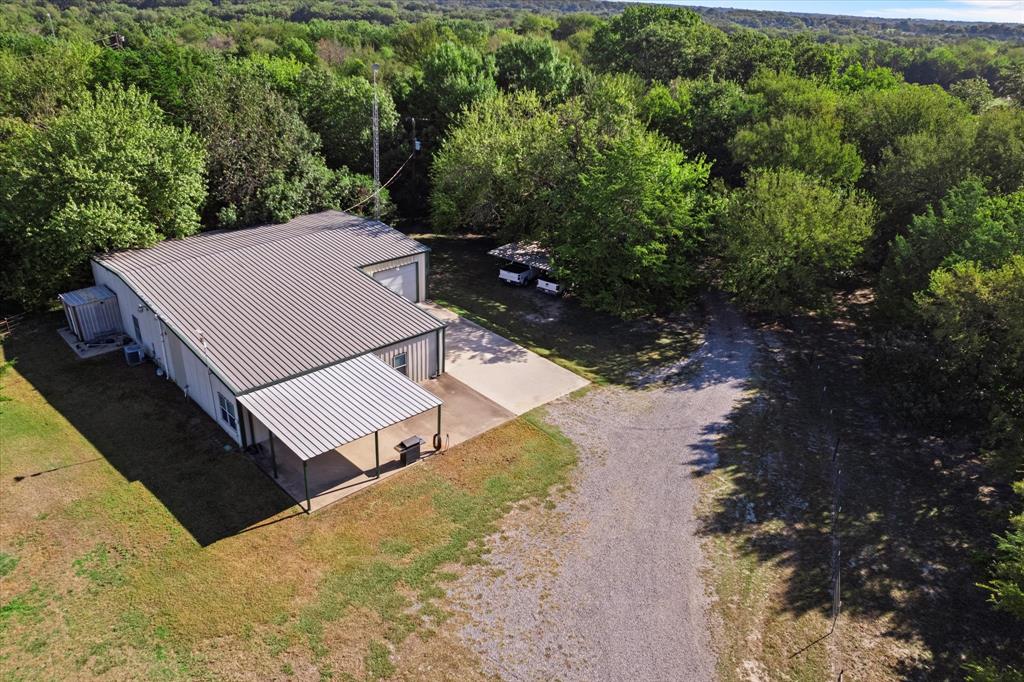 725 Wilson Road Van Alstyne, TX 75495 - Photo 37 of 40 an aerial view of a house with a yard