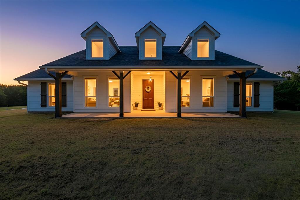 725 Wilson Road Van Alstyne, TX 75495 - Photo 4 of 40 a front view of a house with a yard