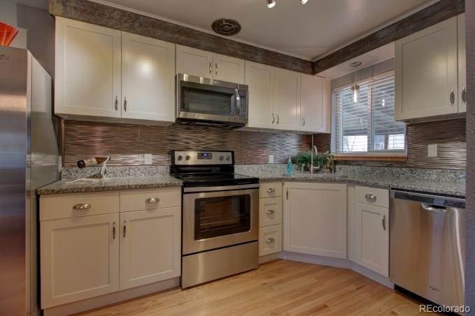 4550 Yarrow Street Wheat Ridge, CO 80033 - Photo 7 of 20 Gallery Image 7