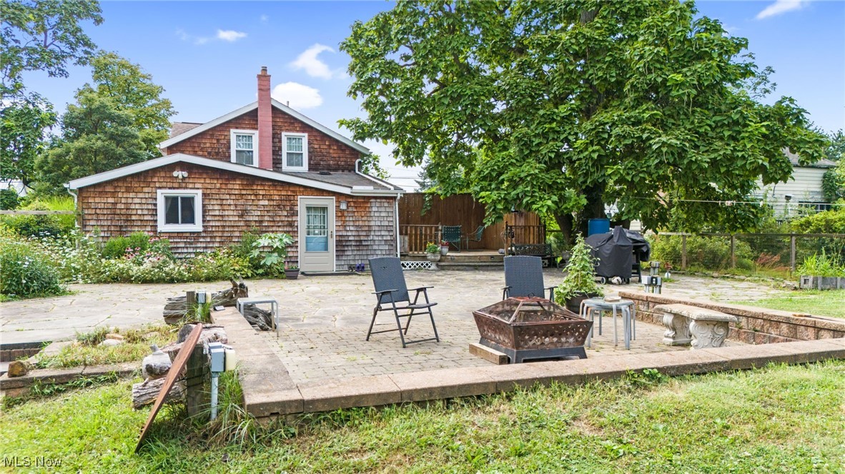 3945 Columbia Road Medina, OH 44256 - Photo 26 of 40 Fenced backyard featuring a fire pit, a patio, and a grill