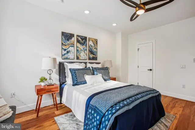 a bath room with a shower and a bath tub