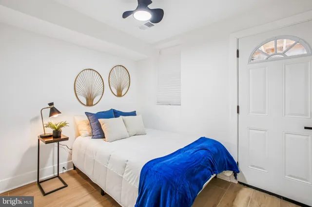 a swimming pool with outdoor seating and yard