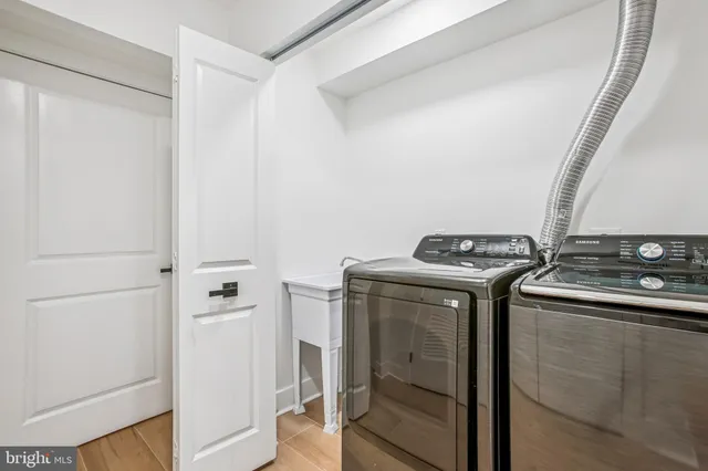 a view of a building and car parked