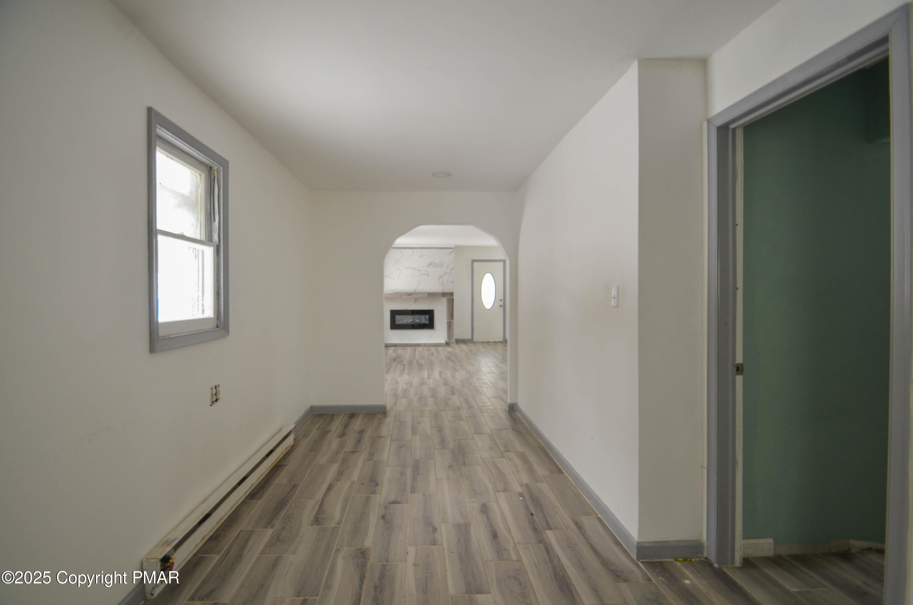 1108 Fir Road Effort, PA 18330 - Photo 5 of 22 a view of a room with wooden floor and a window