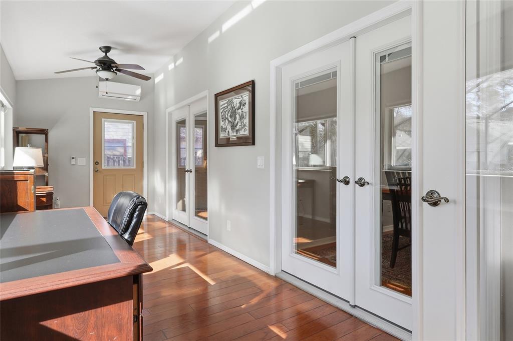 3488 Ridge Boulevard Palm Harbor, FL 34684 - Photo 23 of 30 a view of a hallway with a mirror and furniture