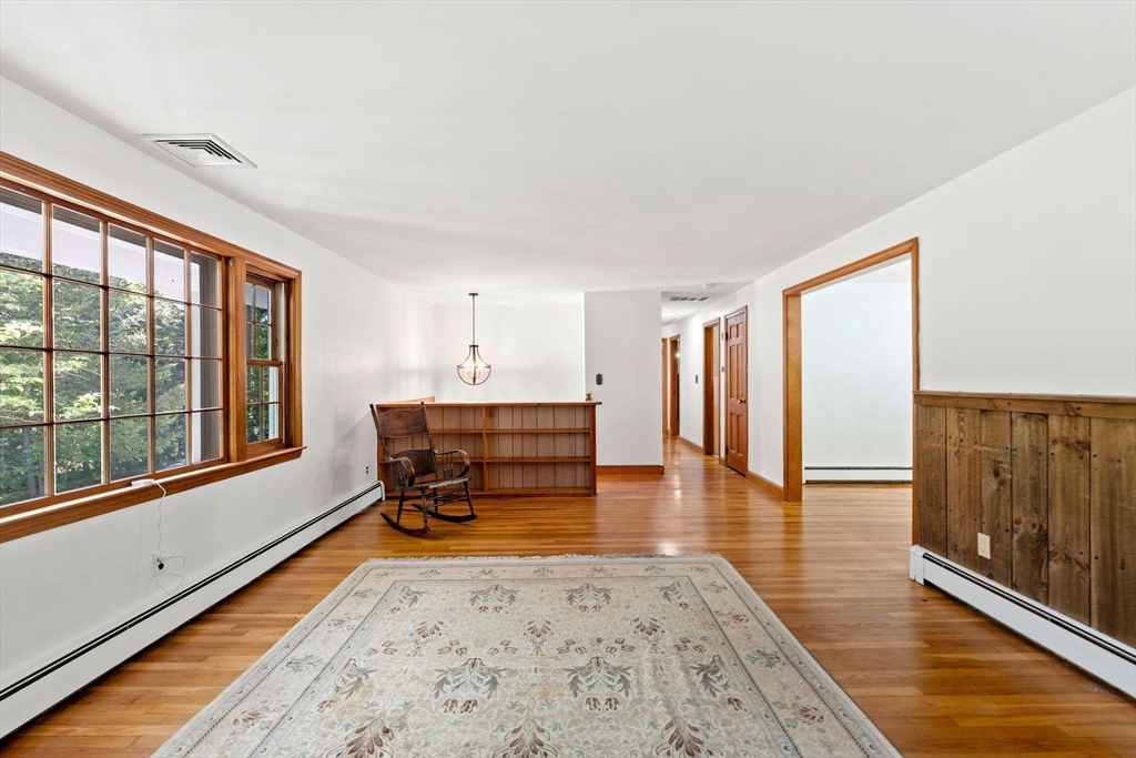 371 Longley Road Groton, MA 01450 - Photo 13 of 33 a living room with furniture and large windows