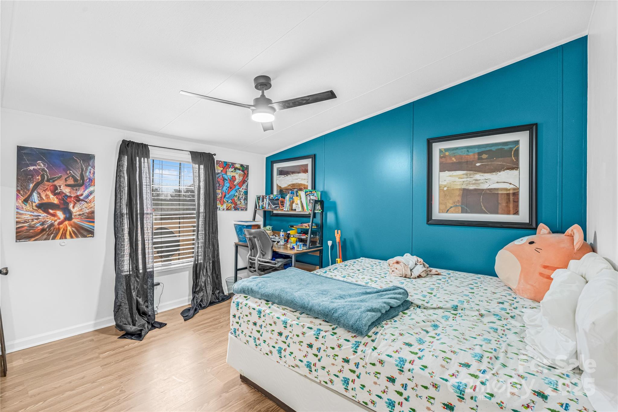 2235 Sandy Ridge Church Road Morven, NC 28119 - Photo 23 of 33 a bedroom with a bed dresser and wooden floor