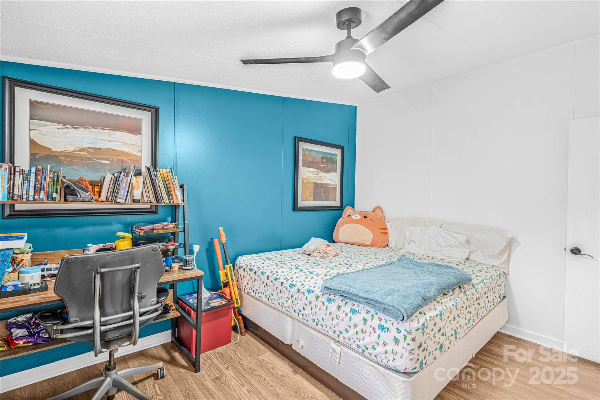 2235 Sandy Ridge Church Road Morven, NC 28119 - Photo 24 of 33 a bedroom with a bed a dresser and painting