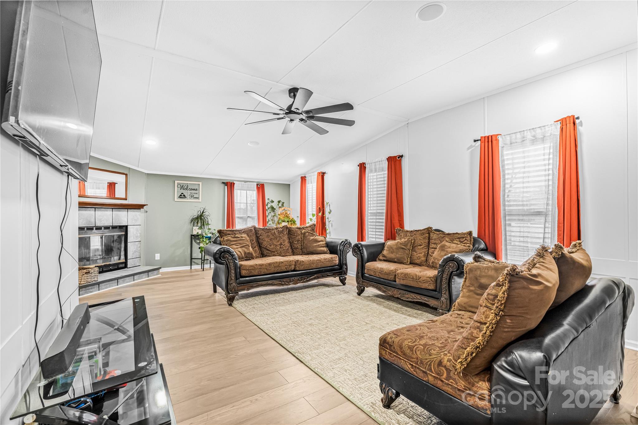2235 Sandy Ridge Church Road Morven, NC 28119 - Photo 8 of 33 a living room with furniture and a fireplace
