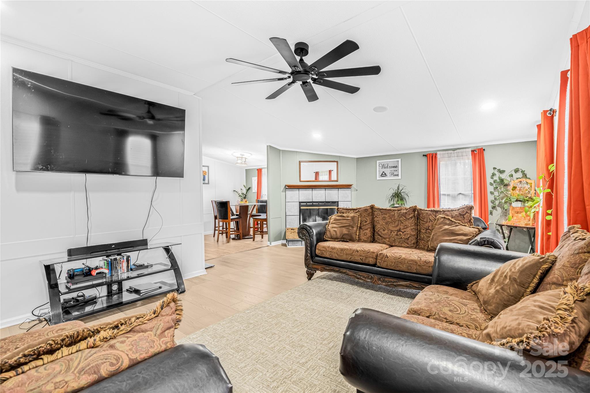 2235 Sandy Ridge Church Road Morven, NC 28119 - Photo 10 of 33 a living room with furniture and a flat screen tv