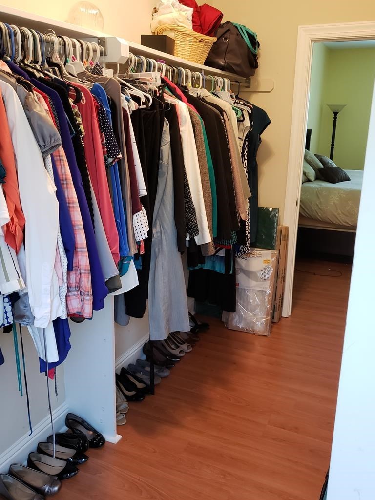 20 Lower Simmons Road Macon, GA 31220 - Photo 16 of 32 a view of walk in closet with clothes and shoes