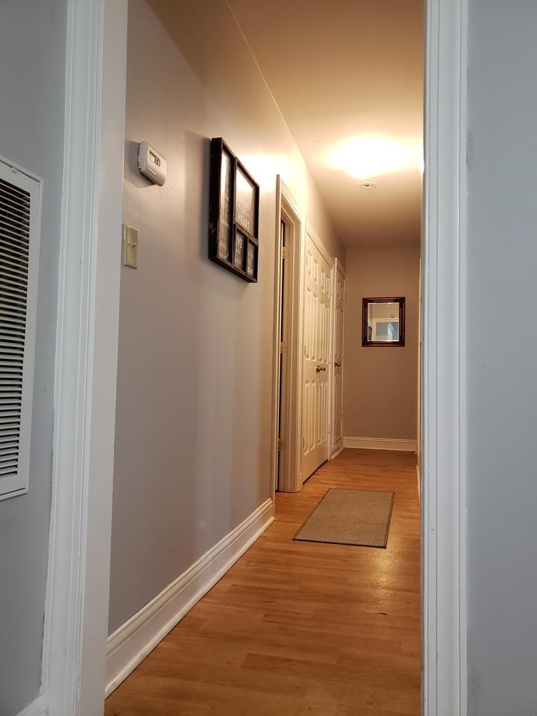 20 Lower Simmons Road Macon, GA 31220 - Photo 20 of 32 a view of a hallway with wooden floor