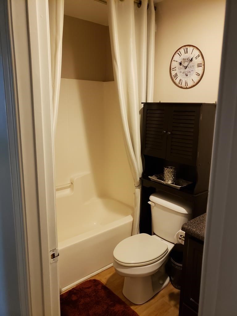 20 Lower Simmons Road Macon, GA 31220 - Photo 23 of 32 a bathroom with a toilet and a shower