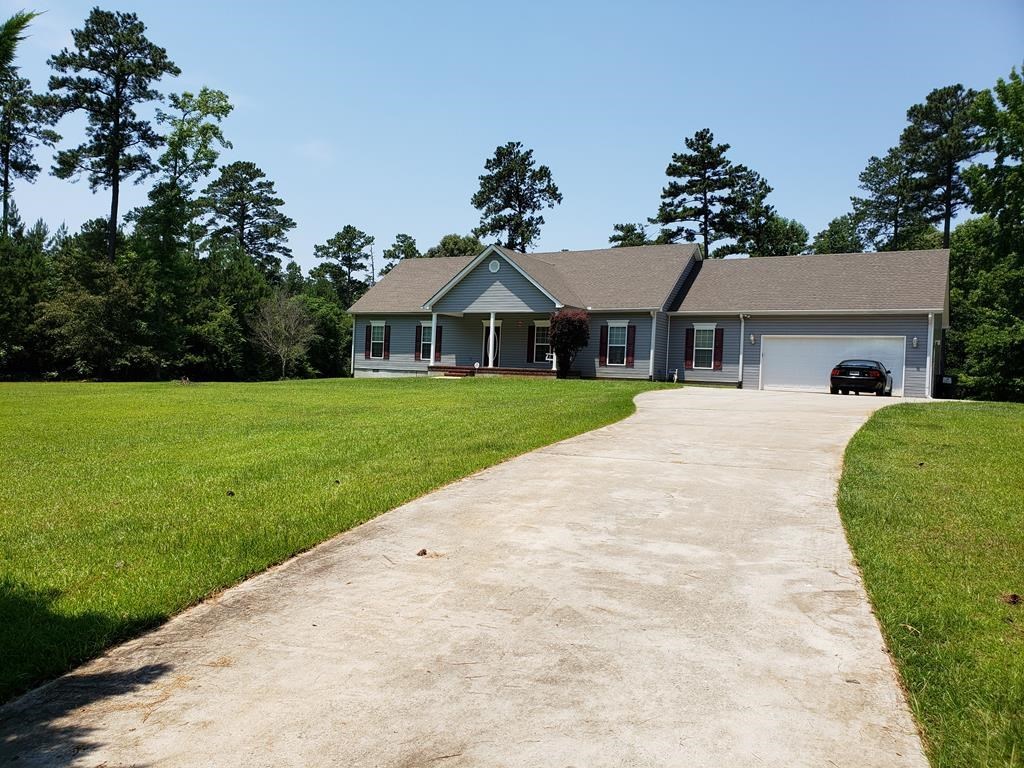 20 Lower Simmons Road Macon, GA 31220 - Photo 26 of 32 a front view of a house with garden