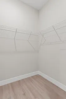 a view of a livingroom with wooden floor