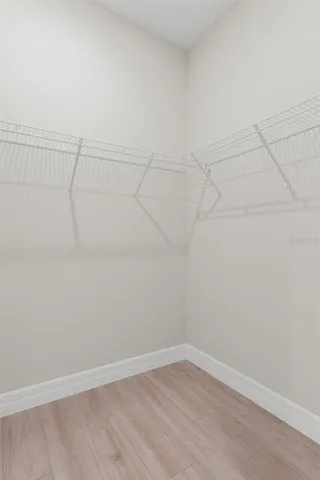 a view of a livingroom with wooden floor