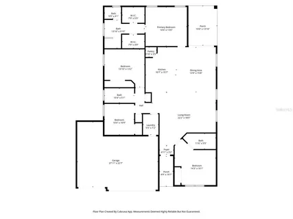 a view of a kitchen with an empty room and a window