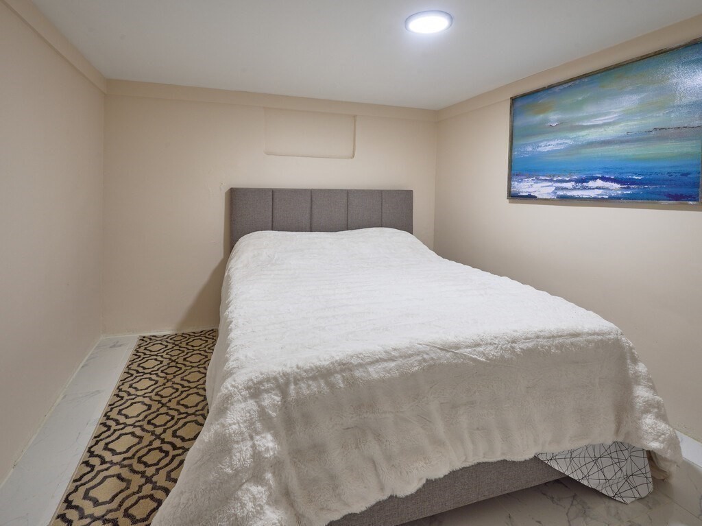 29 Dillon Street Worcester, MA 01604 - Photo 22 of 22 a bedroom with a bed