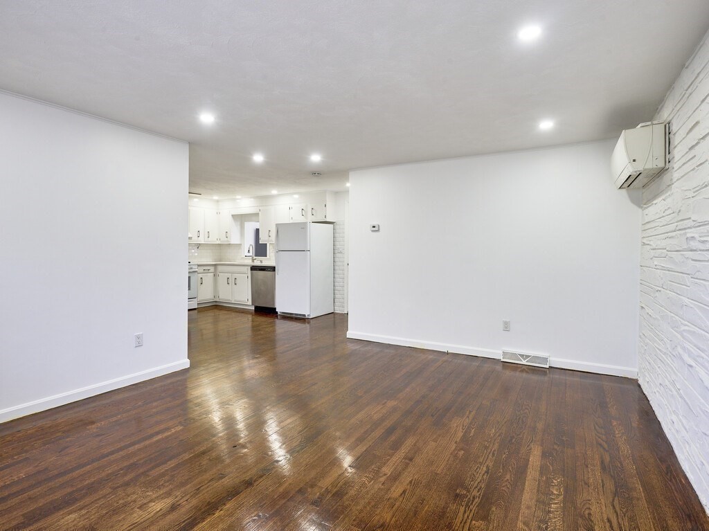29 Dillon Street Worcester, MA 01604 - Photo 10 of 22 a view of empty room with wooden floor