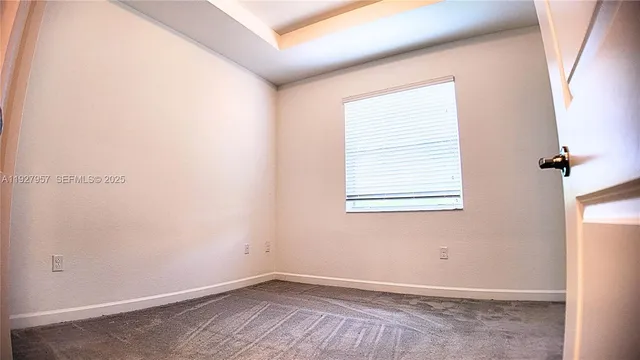 an empty room with a window