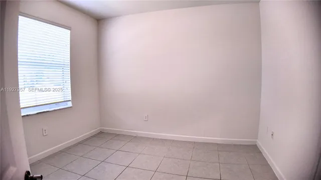 an empty room with a window