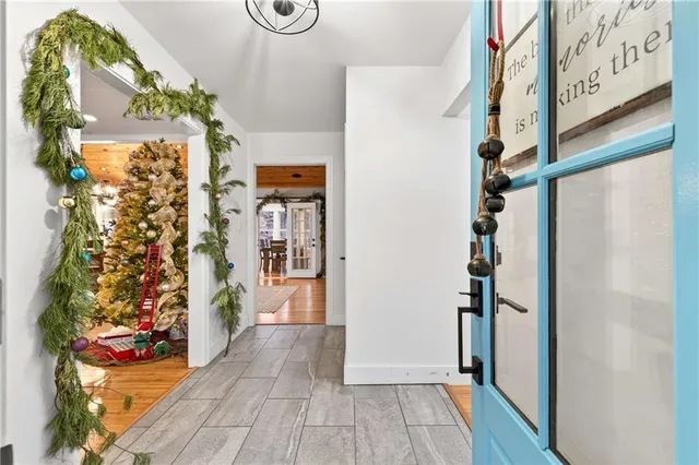 a view of entryway with wooden floor