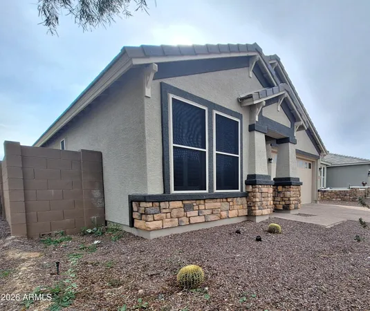 a front view of a house with parking yard