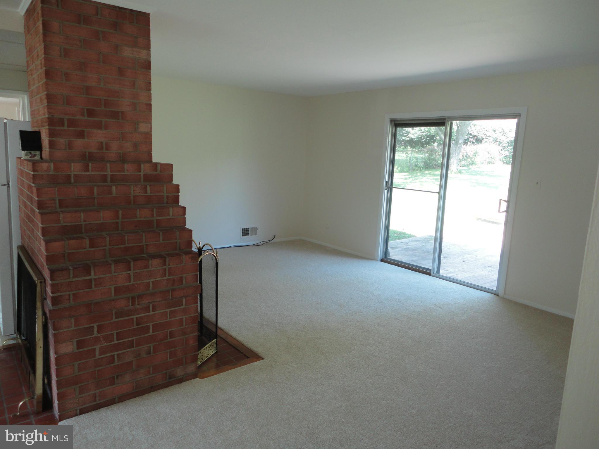 5512 Moultrie Road Springfield, VA 22151 - Photo 17 of 27 an empty room with windows