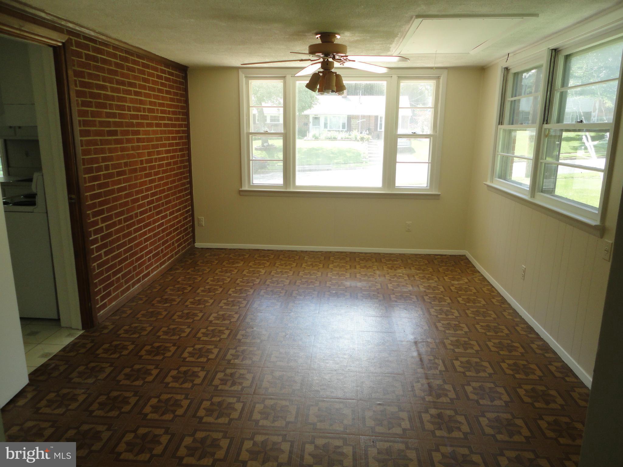 5512 Moultrie Road Springfield, VA 22151 - Photo 20 of 27 a view of an empty room with a window