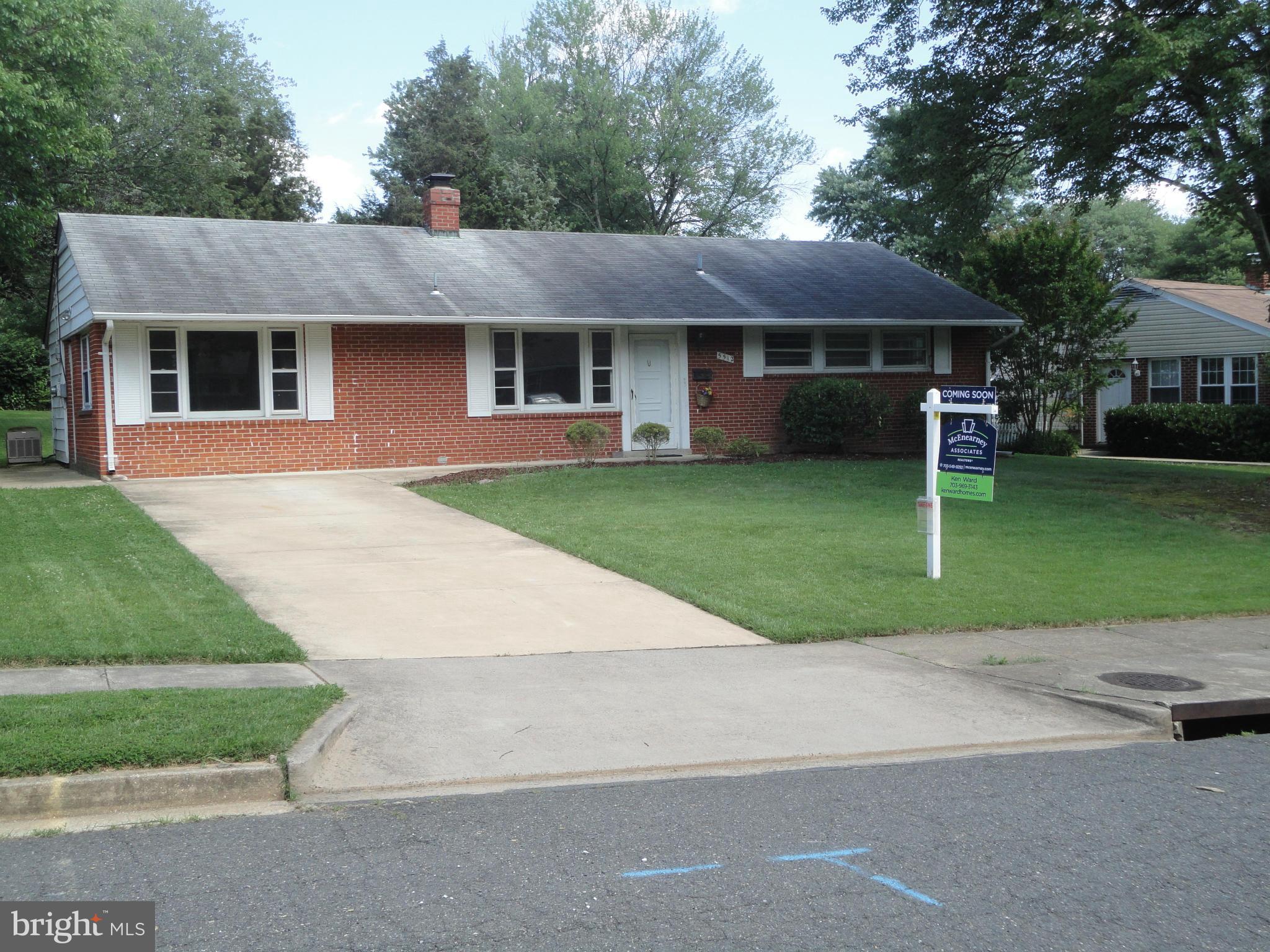 5512 Moultrie Road Springfield, VA 22151 - Photo 3 of 27 front view of a house with a yard