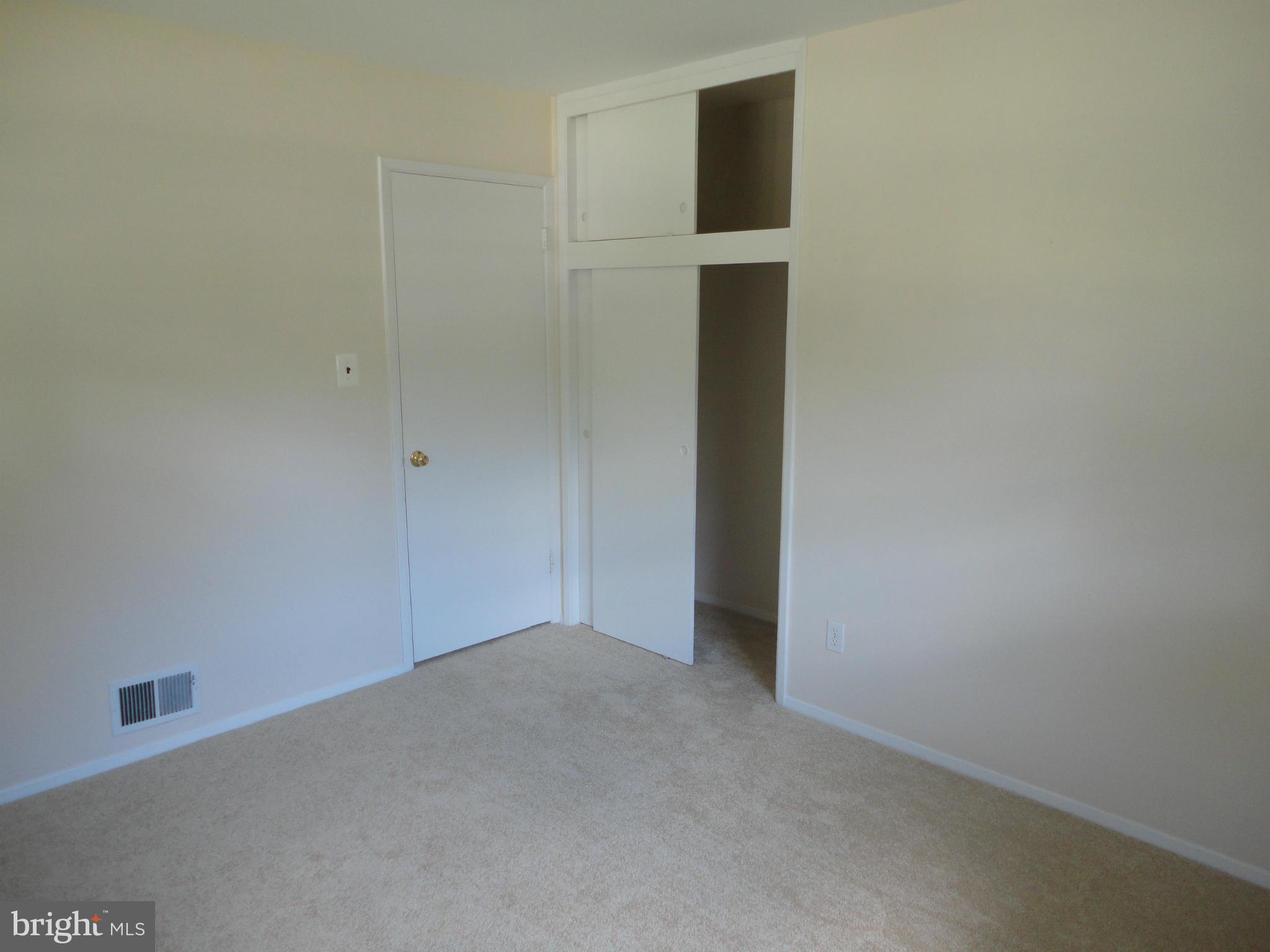 5512 Moultrie Road Springfield, VA 22151 - Photo 26 of 27 wooden floor in an empty room