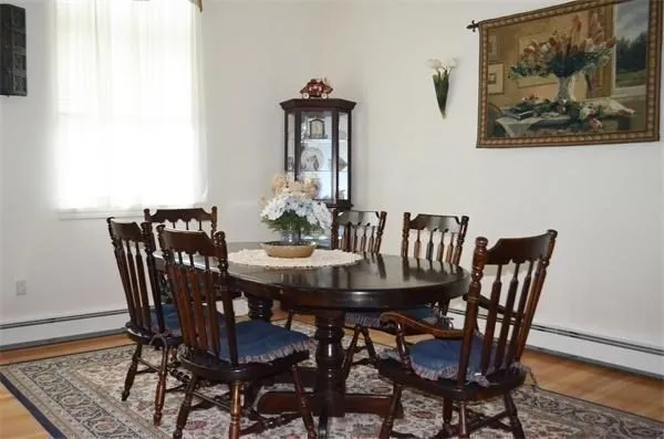 a view of a dining room with furniture